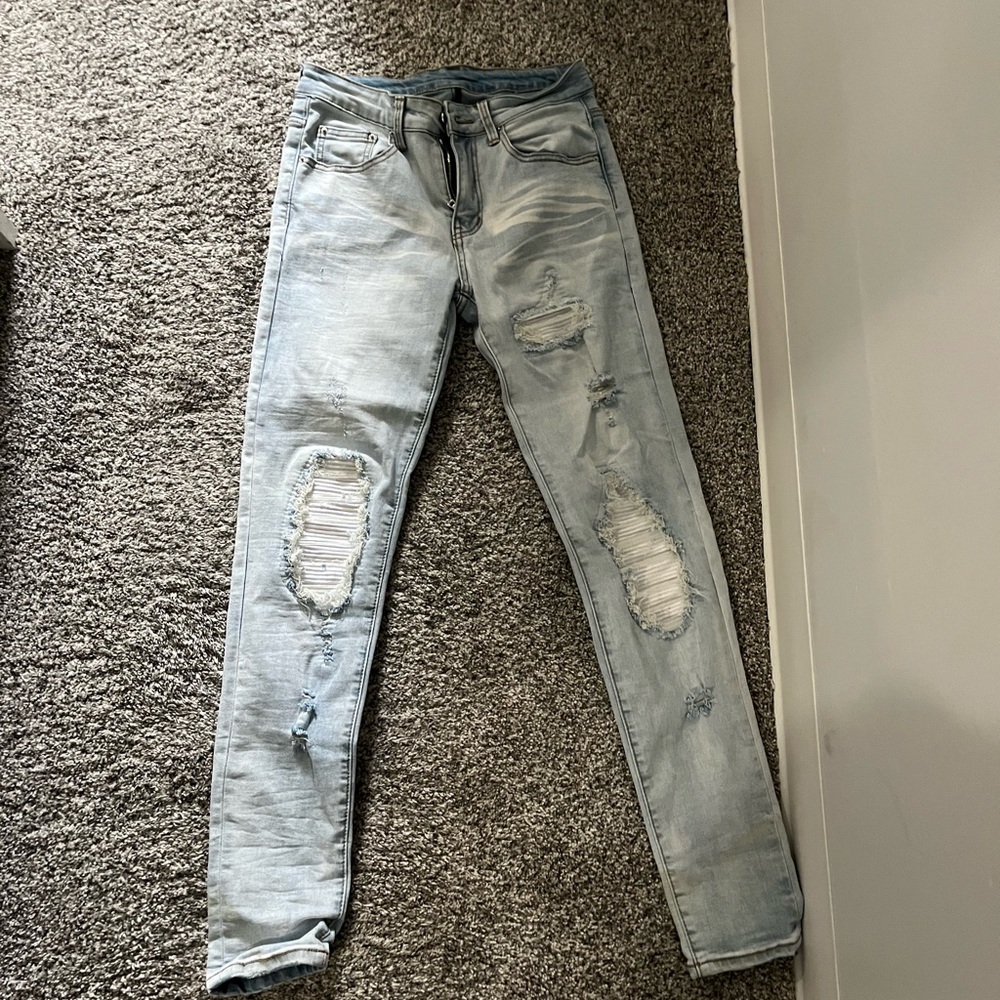 Light blue biker jeans